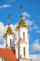 Fototapeta na wymiar Elegant Gothic bell tower of the Resurrection Cathedral in Vitebsk in Belarus