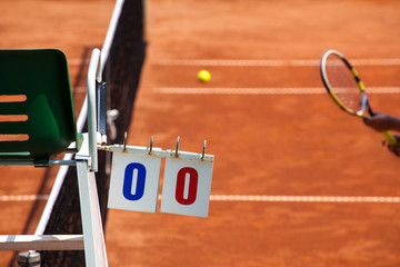 Tennis Player on a Clay Court with Umpire Chair - 207887373