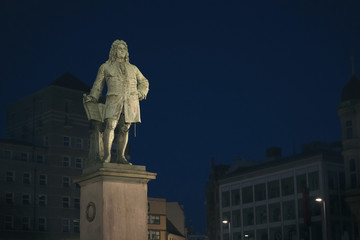 Monument to George Frideric Handel in Halle, Germany, at night.