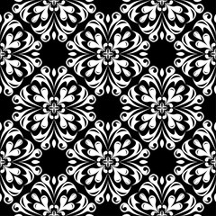 White floral design on black background. Seamless pattern