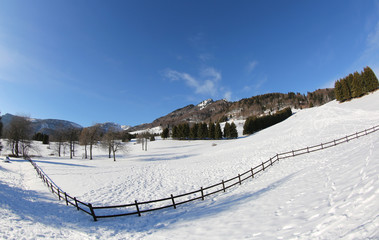 Fototapeta na wymiar panorama of mountains with snow in winter photographed with a fi