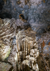 Colorful Cave Ceiling with hanging stalactites