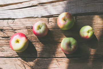 Apples on a wooden background.