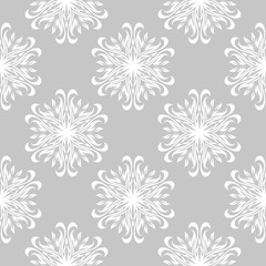 White floral seamless design on gray background