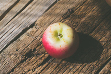 Apples on a wooden background.