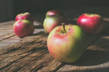 Apples on a wooden background.