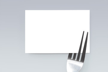 Blank paper mockup card and fork. Creative layout for business food concept.