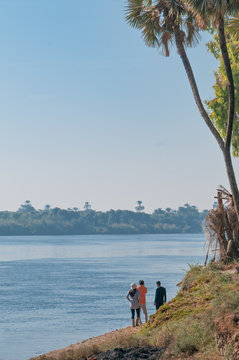 Tourists with a guide on bank of Nile near Aswan in Egypt.
