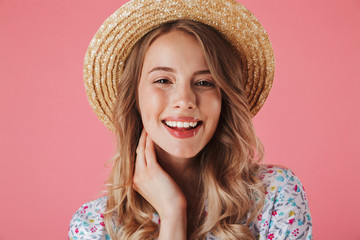 Close up portrait of a happy young woman in summer dress