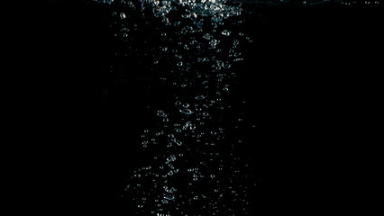 Soda water liquid splashing in black background