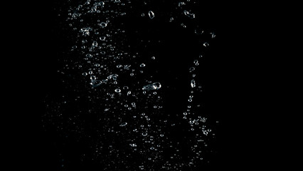 Naklejka na ściany i meble Soda water liquid splashing and floating in black background which represent feeling of freshness or refreshing from carbonate drink 