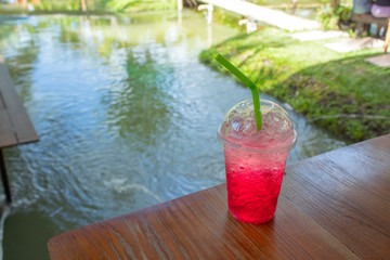 Red soda cold thirst in garden.