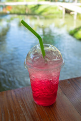 Red soda cold thirst in garden.