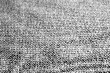 Knitting pattern with blur effect in black and white.