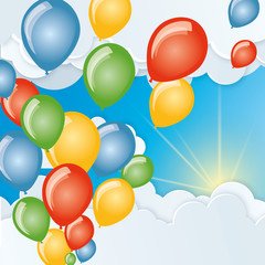 balloons fly in the sky among the clouds