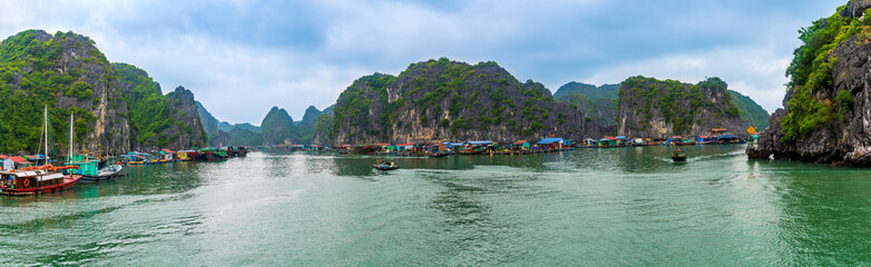 Panorama of LAN HA Bay destination beach and Island with touring floating fishing village the UNESCO World Heritage Site © pomphotothailand