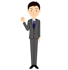 ガッツポーズをする若いビジネスマン