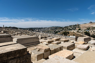 Fototapeta na wymiar Graves in Jewish Cemetery. Jerusalem, Israel