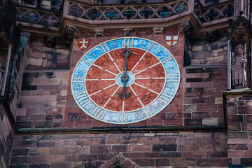 Fototapeta na wymiar curch-clock of cathedral Freiburg