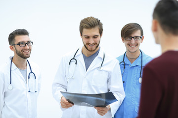 doctors congratulating the patient's recovery