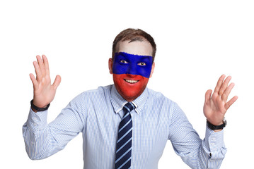 Young man with Russia flag painted on his face