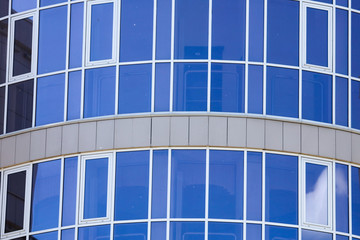 Blue glass windows on the house as a background