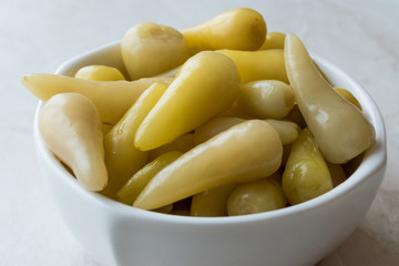 Pickled Green Pepper Pickles in Bowls.