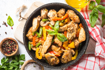 Chicken fried with vegetables.