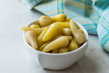 Pickled Green Pepper Pickles in Bowls.