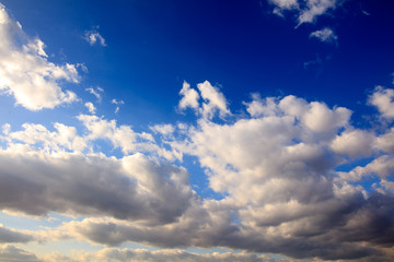 Clouds on a blue sky as a background