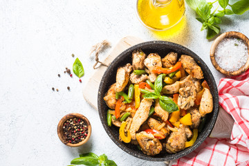 Chicken fried with vegetables.
