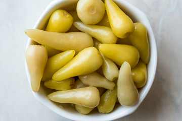 Pickled Green Pepper Pickles in Bowls.