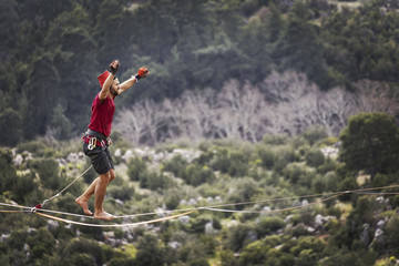 Fototapeta premium Walk a line in the sky.Turkish Highline Carnival in Antalya.