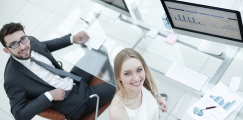 business people sitting at office desk in office. top view