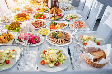 Set of cold snacks, canape, beverages, closeup