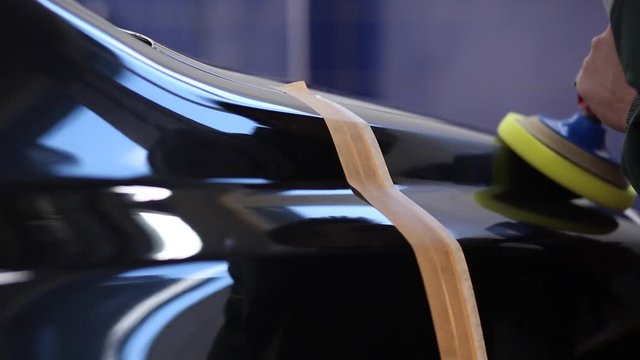 Car polishing process. Close up.