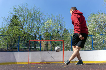 teenager playing football rabona