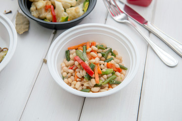 Cooked beans with vegetables. Vegetarian food.