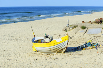 Fishing boat on Baltic Beach in Piaski near Krynica Morska, Poland