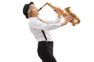 Fototapeta premium Female jazz musician playing a saxophone