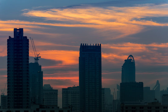 Silhouette of Bangkok city view with beautiful sunrise background