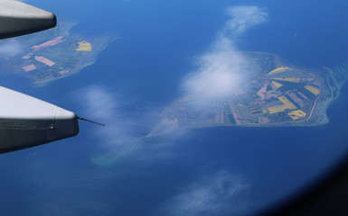 Fototapeta na wymiar Aerial view of Danish islands of Femø and Fejø and blue sea waters
