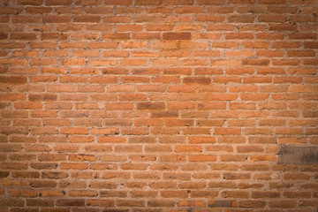 Old red brick wall background and texture with space.