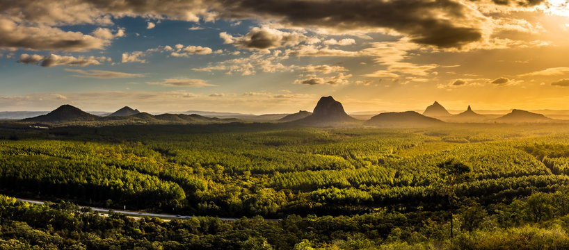 Fototapeta Panoramic view of Glass House Mountains at sunset visible from Wild Horse Mountain