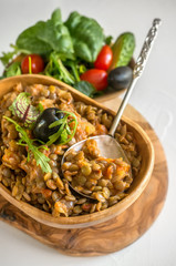 Turkish traditional Lentil salad and a slice of cucumber and green ezogelin, tarhuna. The view from the top
