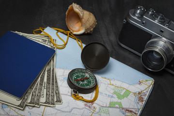 Preparation for summer vacation. Travel set of cameras, sunglasses Passport and map