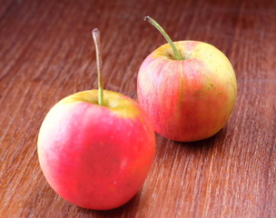 Fresh Juicy red apples on old wooden