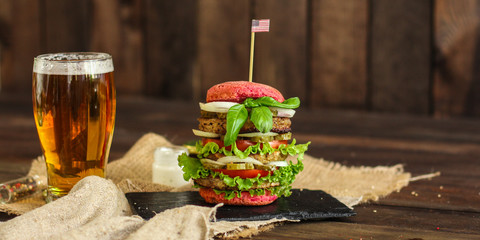 burgers on a slate plate and frothy beverage  - fast food (sandwich) - cuisine.  Food background