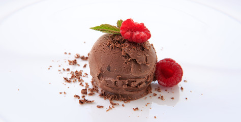 Chocolate ice cream with Raspberries on white background.