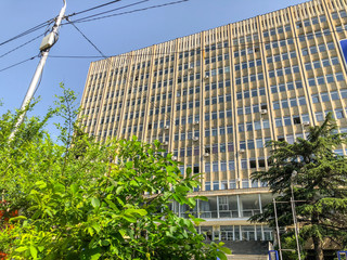 Fototapeta na wymiar TBILISI, GEORGIA - - MAY 17, 2018: View of the building of Ivane Javakhishvili Tbilisi State University. Springtime in city